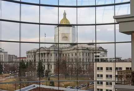 The view out of the atrium of the judicial building towards the capitol building