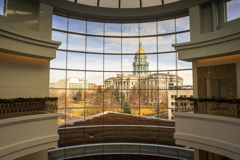 The view out of the atrium of the judicial building towards the capitol building